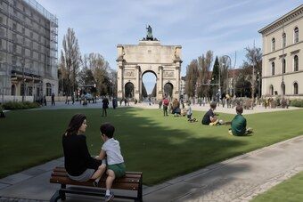 Idea: a lawn with a family on a bench.
