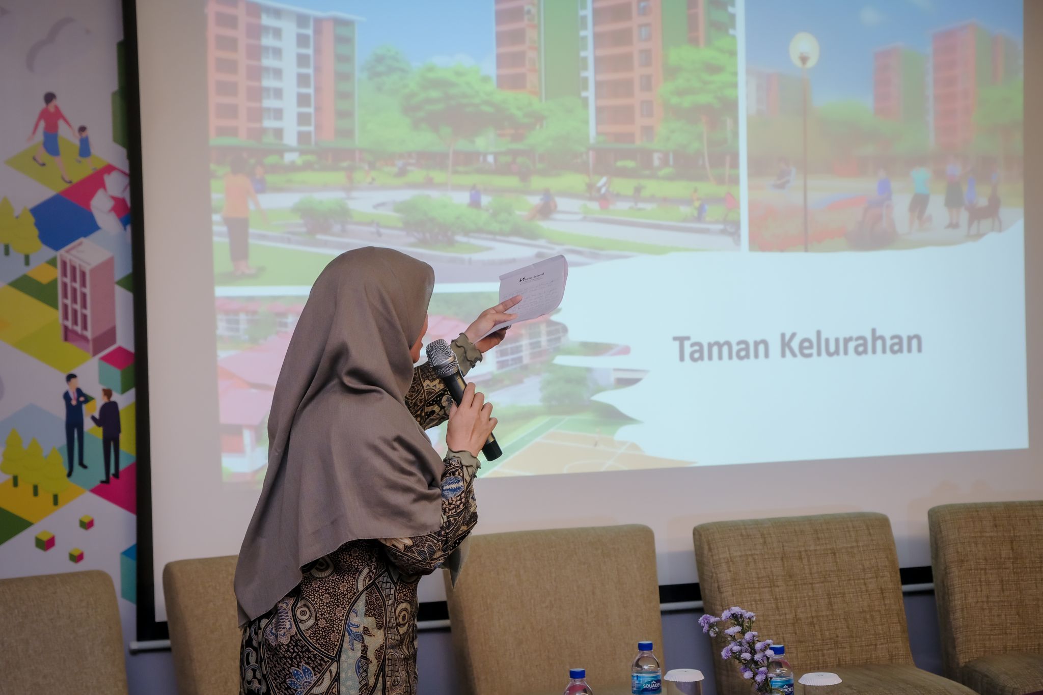 A person presenting a slideshow