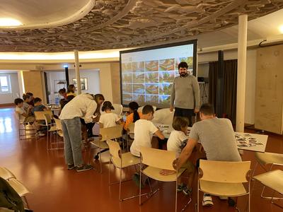 Childrens working on tablets and computer