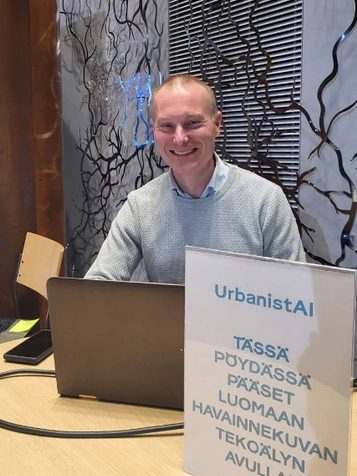 An AI facilitator at a desk